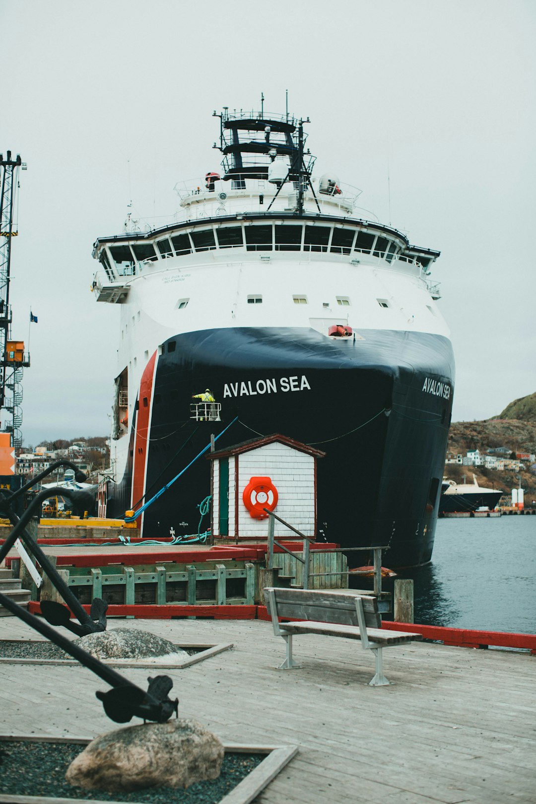 white and black ship on dock during daytime