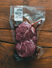 raw meat in clear plastic pack