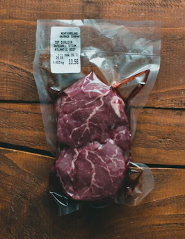 raw meat in clear plastic pack