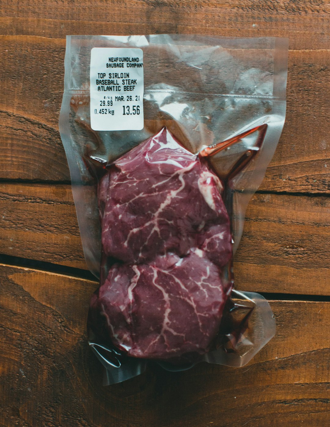 raw meat in clear plastic pack