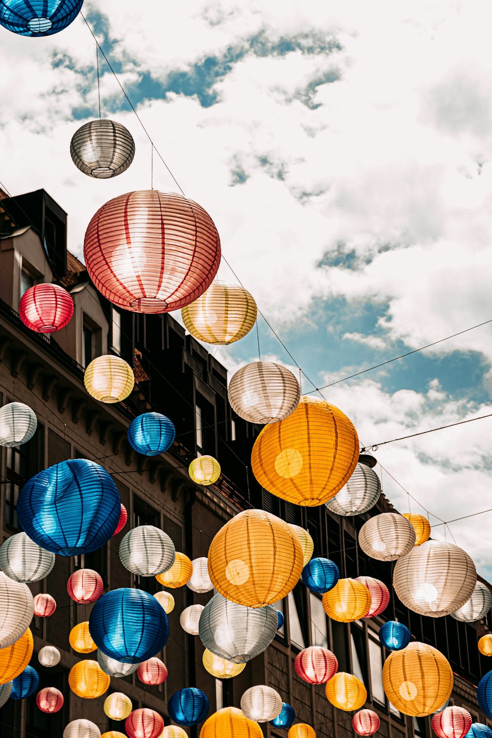 red blue and yellow paper lanterns