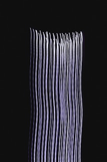white and black striped textile