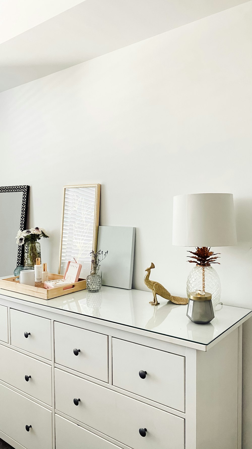 white and brown table lamp on white wooden table