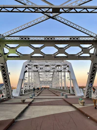 people walking on bridge during daytime