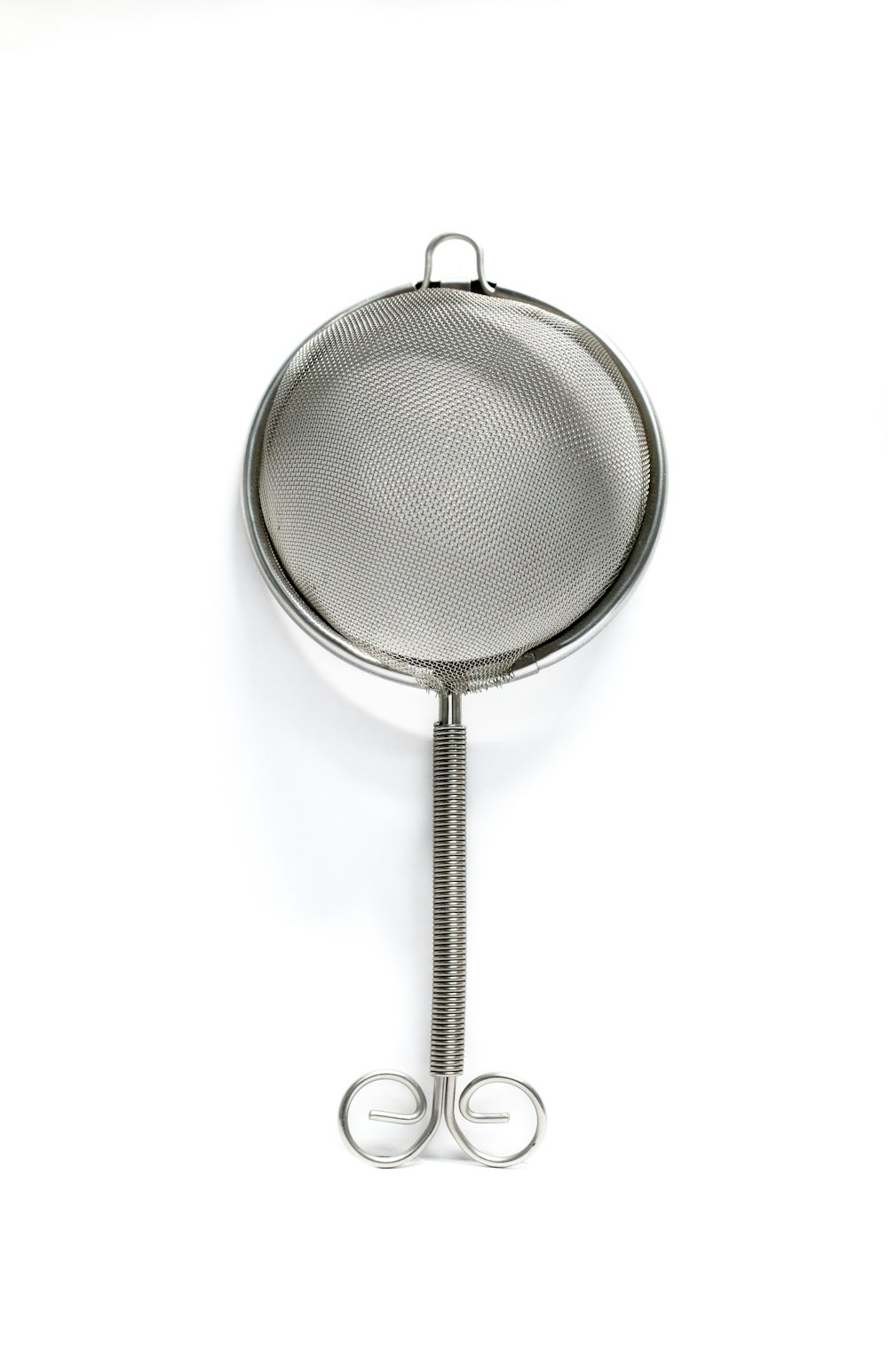 stainless steel strainer with white background