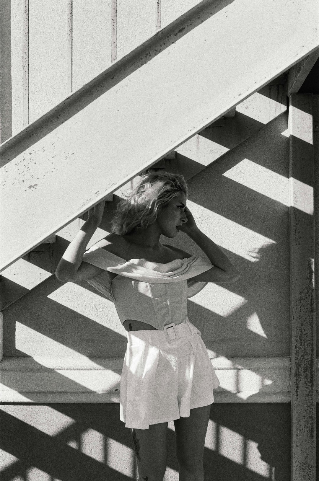 grayscale photo of woman in white dress