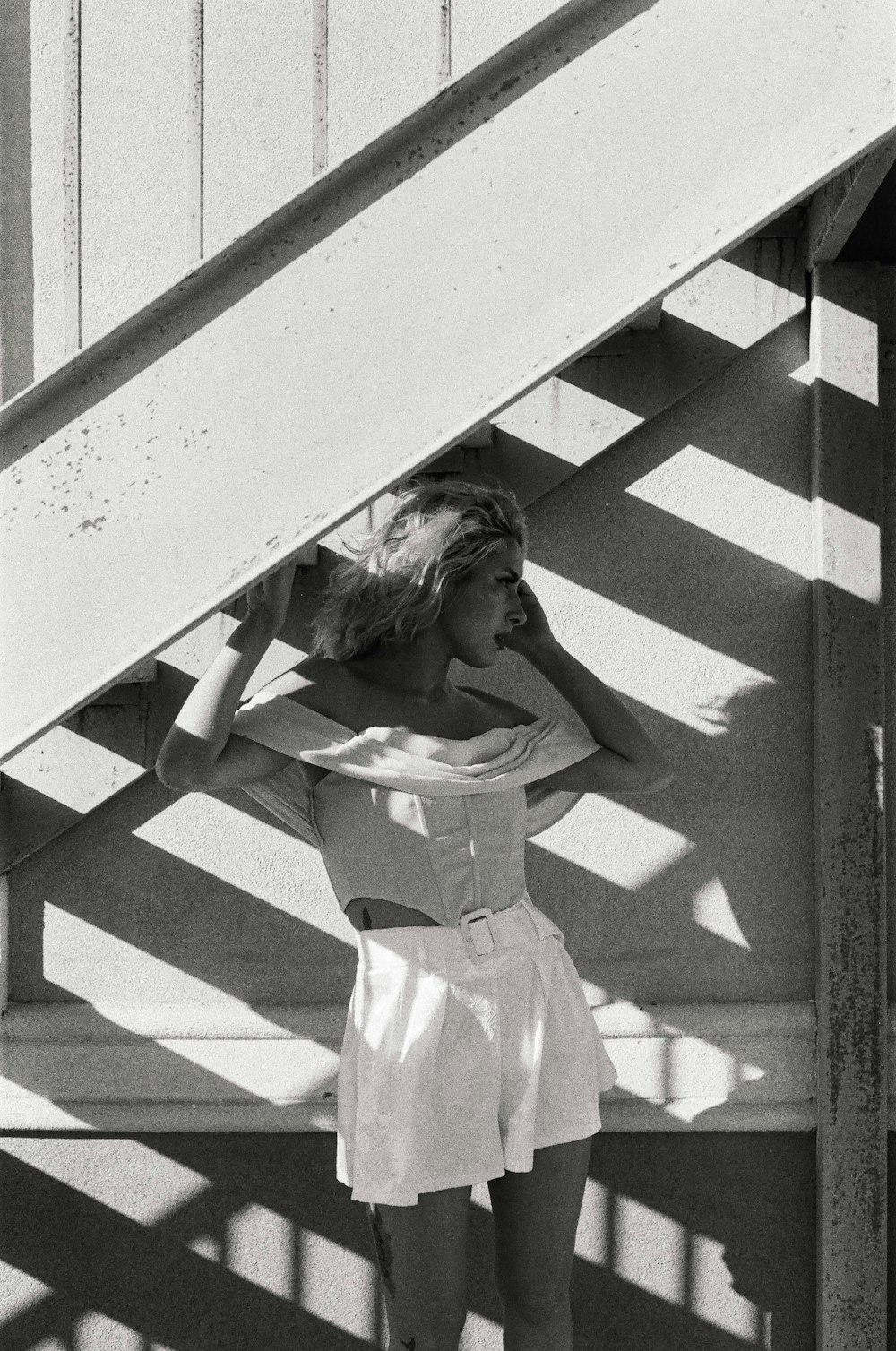 grayscale photo of woman in white dress