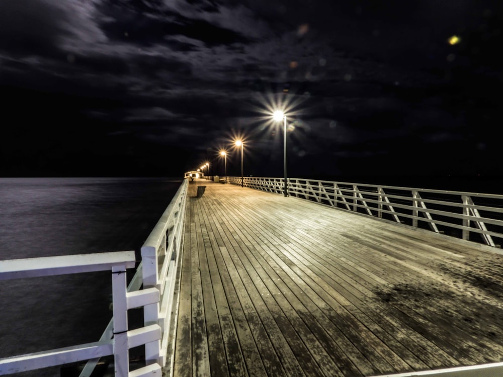 white wooden dock during night time