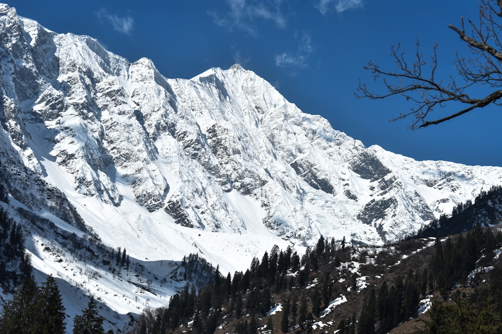 snow covered mountain during daytime