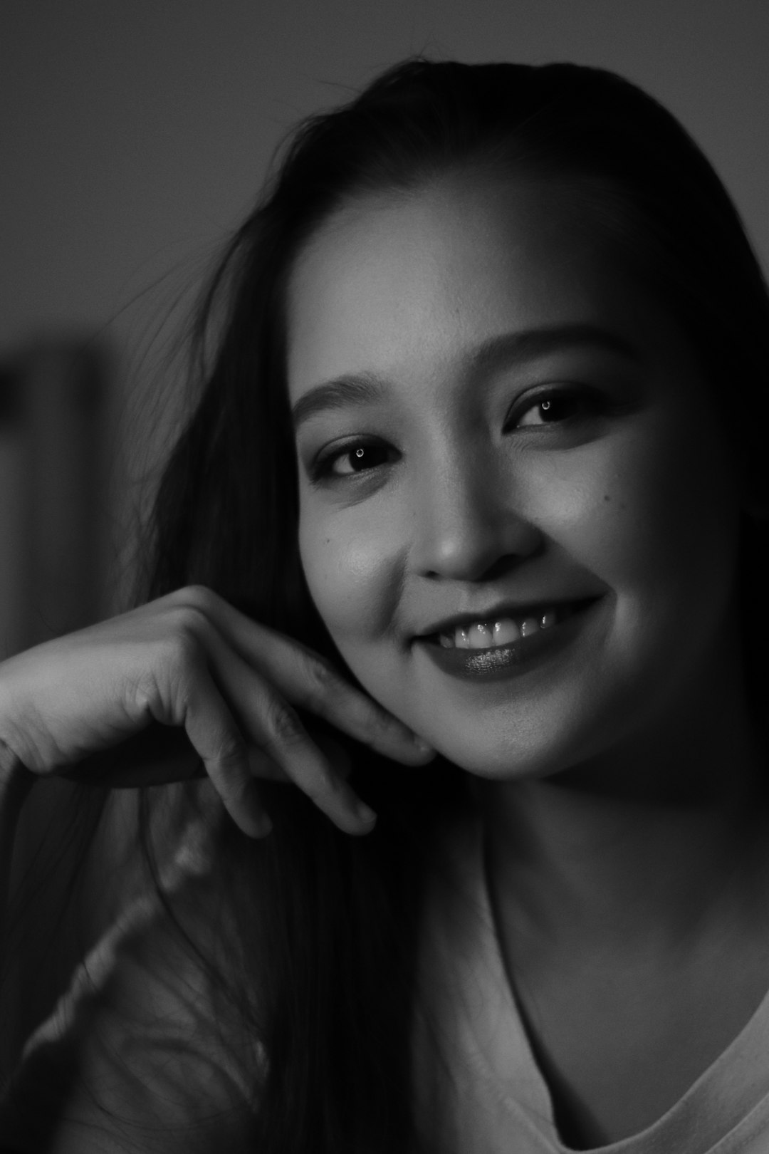 grayscale photo of smiling woman