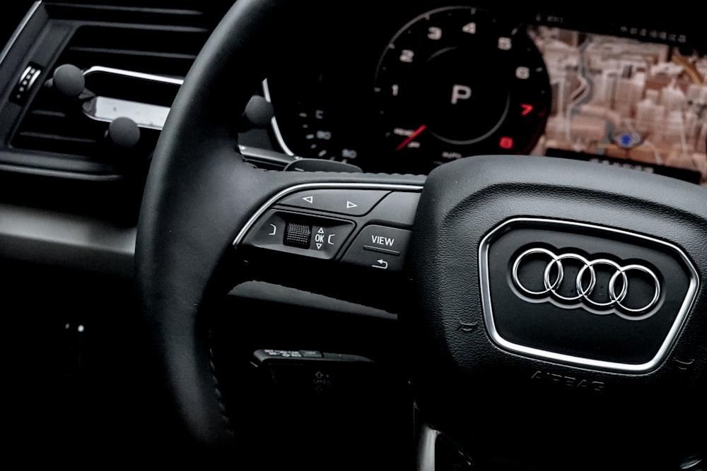 black and silver car steering wheel