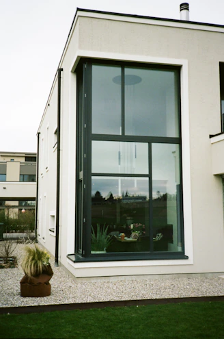 white wooden framed glass window