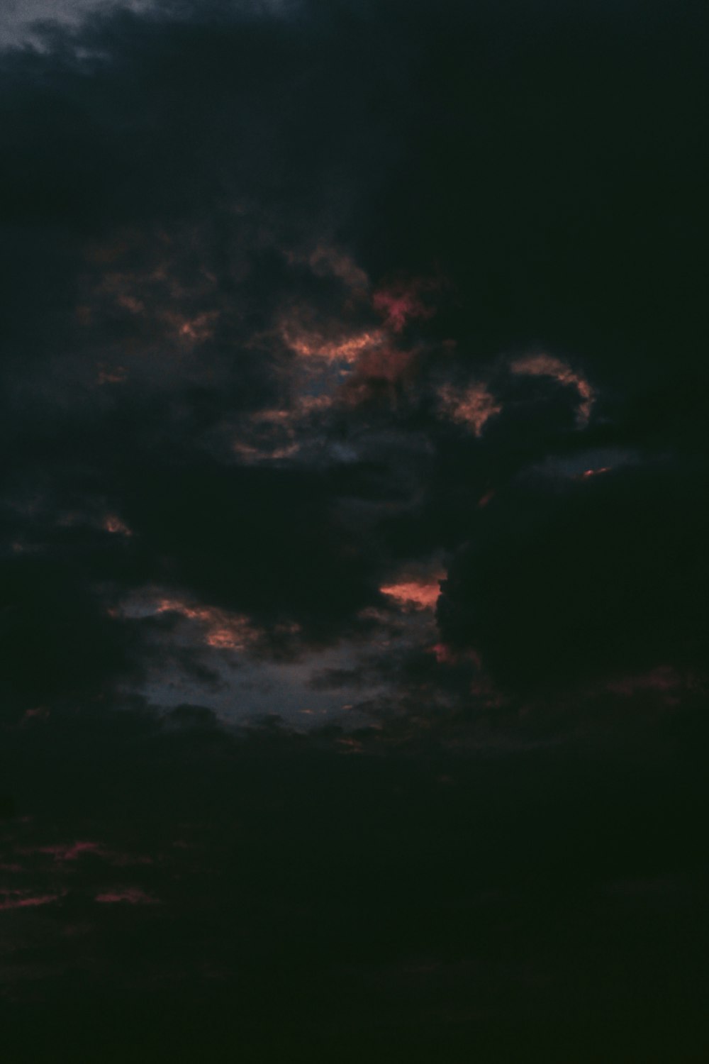 black clouds during night time