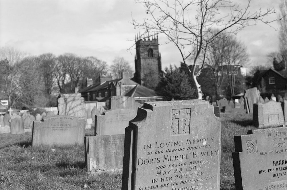 grayscale photo of concrete tomb