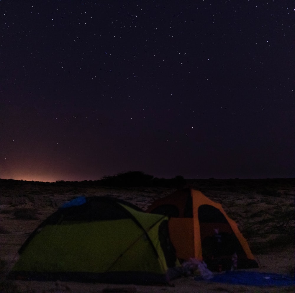 green tent under starry night