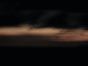 A dark, moody image representing connection and creativity.
