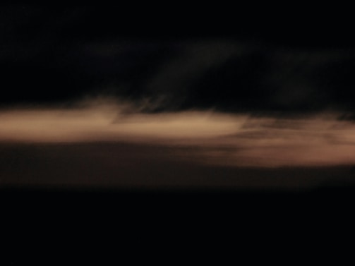 A dark, moody image representing connection and creativity.