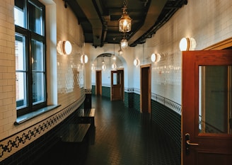 brown wooden bench in hallway