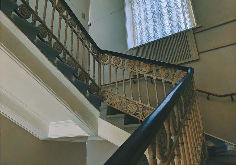 white and brown wooden staircase