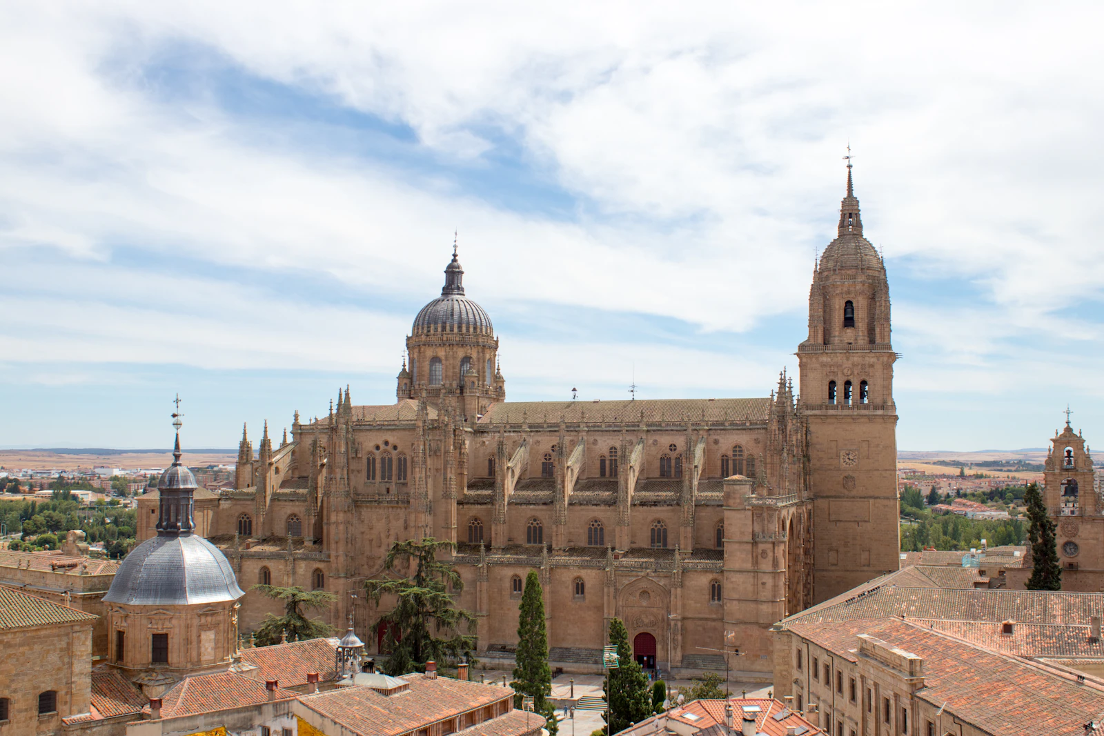 The Old and New Cathedrals side by side above the rooftops — Salamanca, Spain