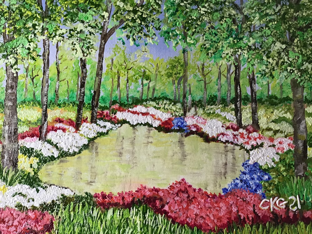 rot-blaue und weiße Blüten auf grünem Grasfeld