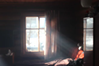 A serene setting with soft light filtering through a window, symbolizing peace.