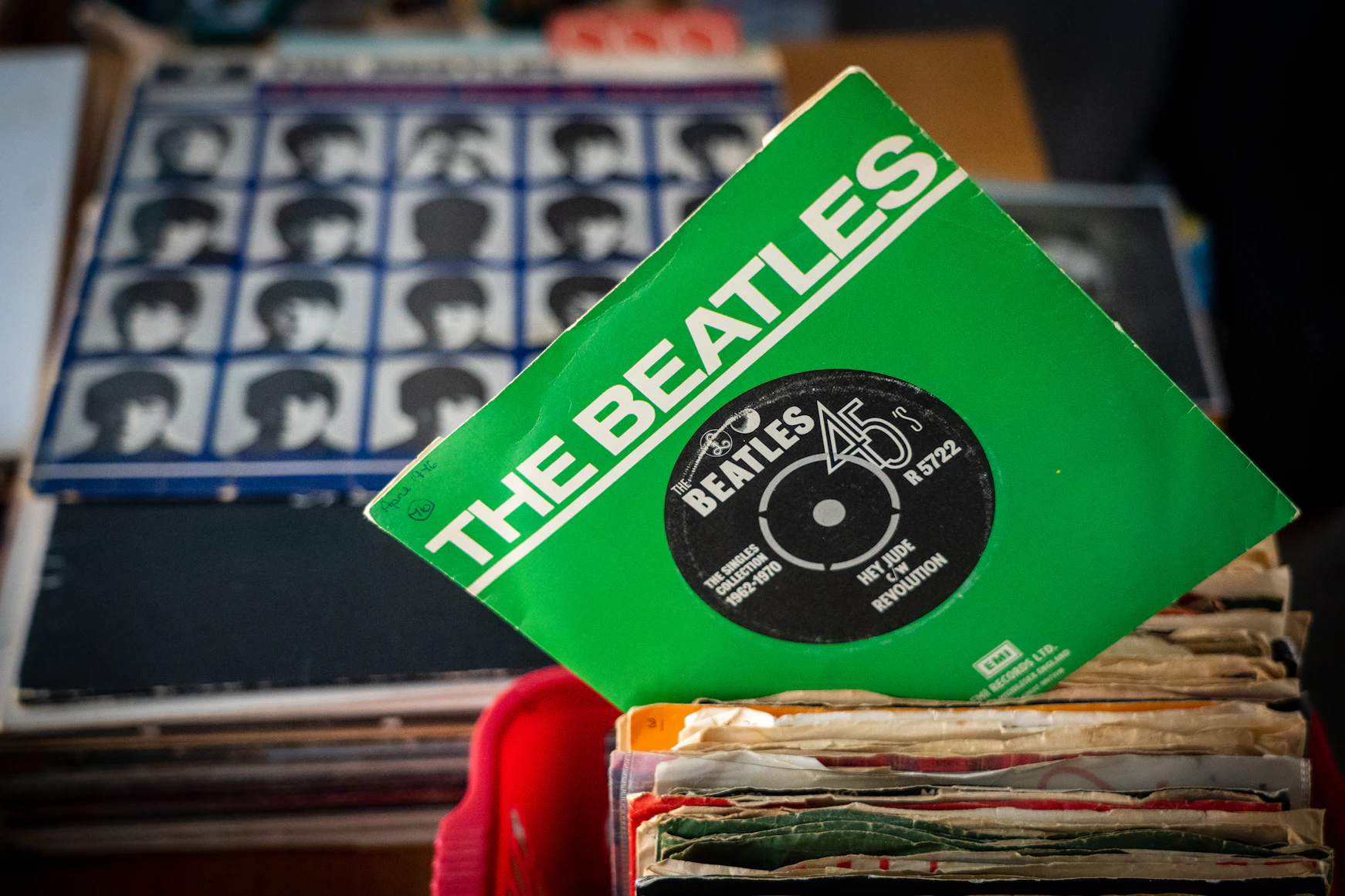 Beatles memorabilia and imagery reflecting the band's cultural footprint in the United States