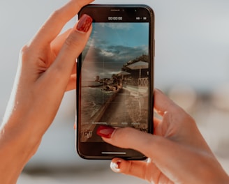 person holding black samsung android smartphone