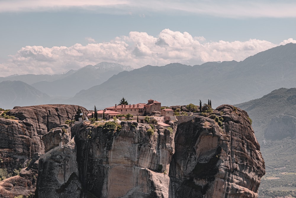 people standing on cliff during daytime