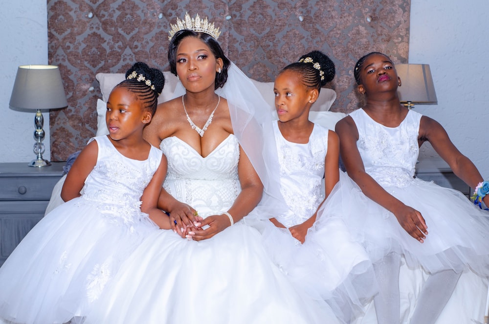 group of women in white dresses