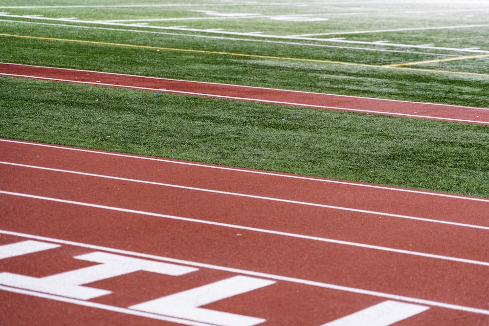 green and brown football field