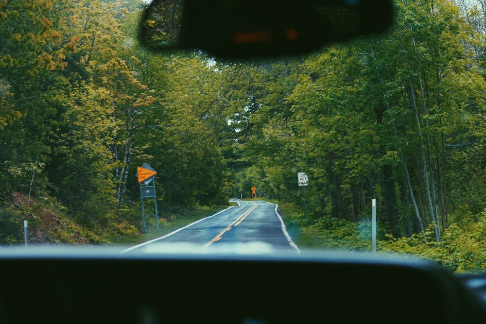 black car on road during daytime