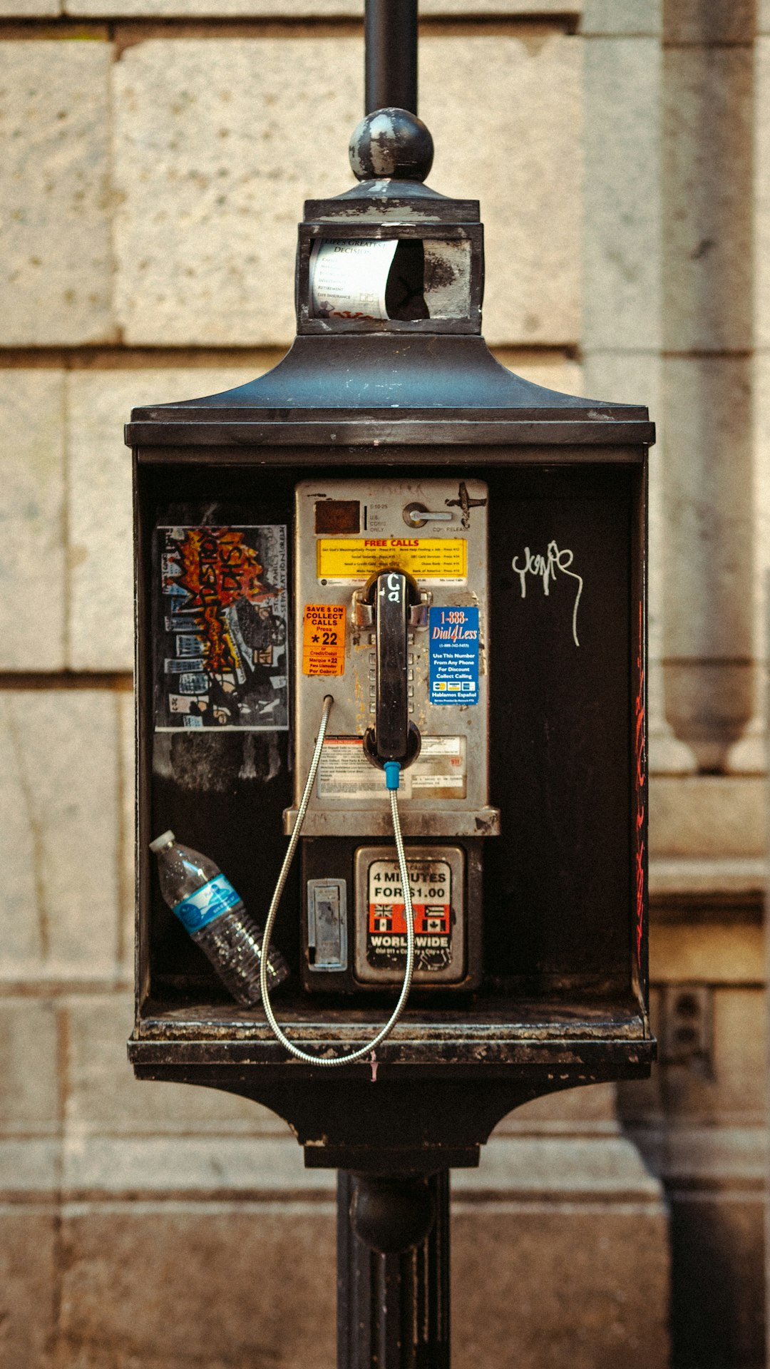 black and silver telephone booth