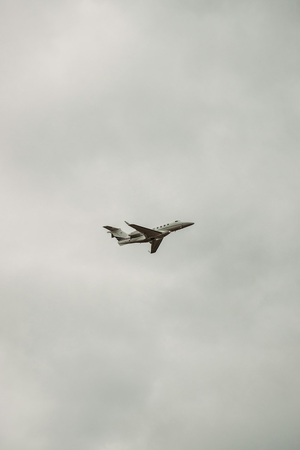 black jet plane in mid air