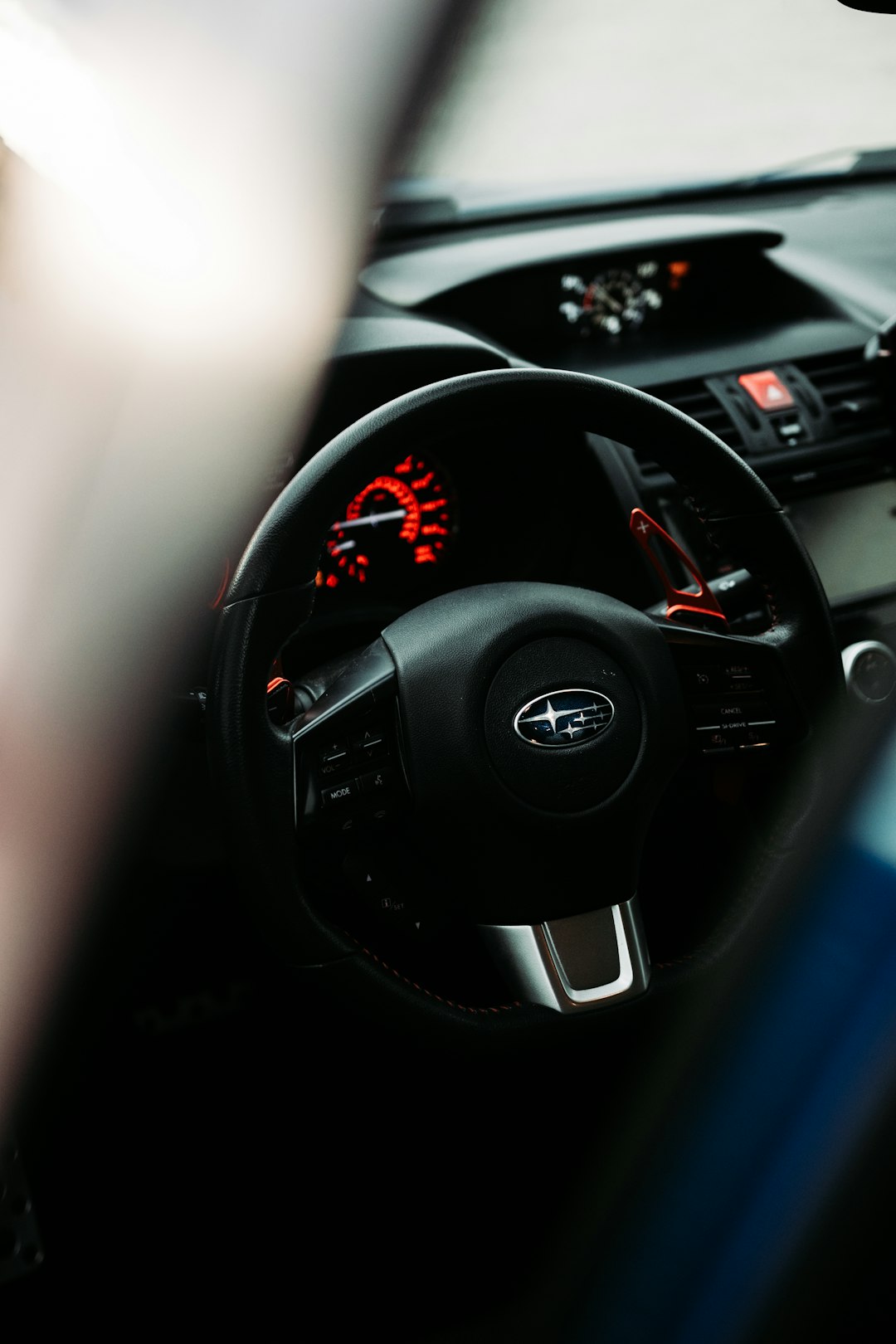 black and silver mercedes benz steering wheel