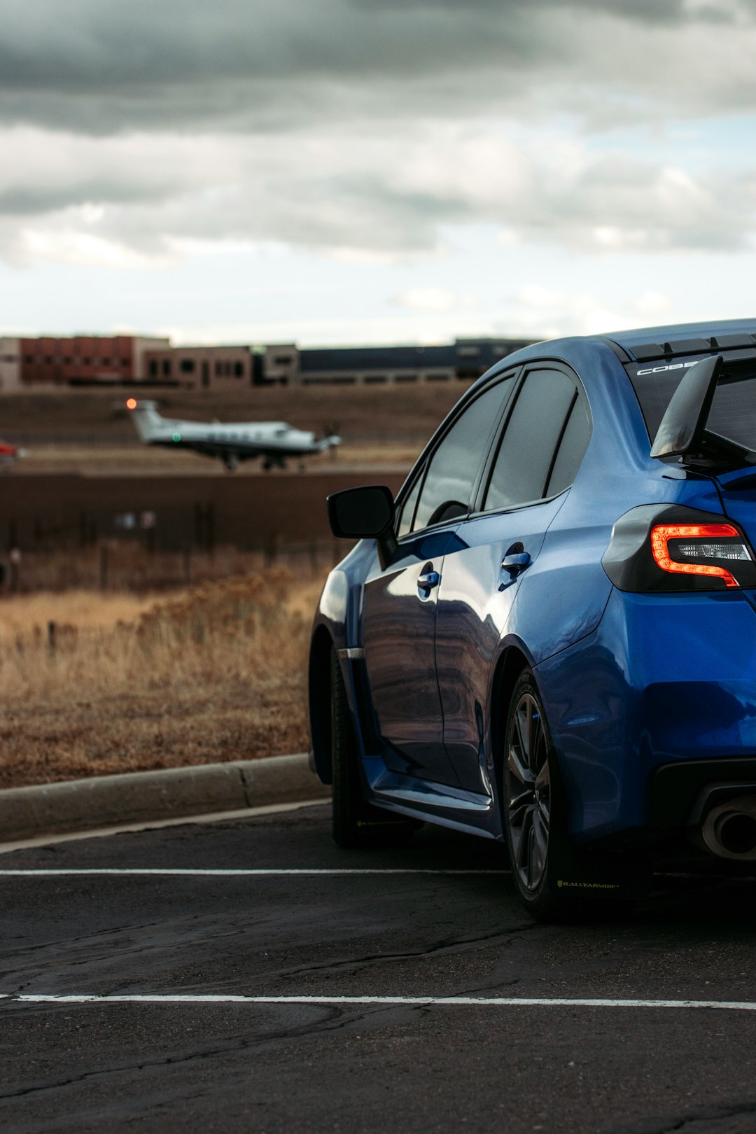 blue bmw m 3 on road during daytime