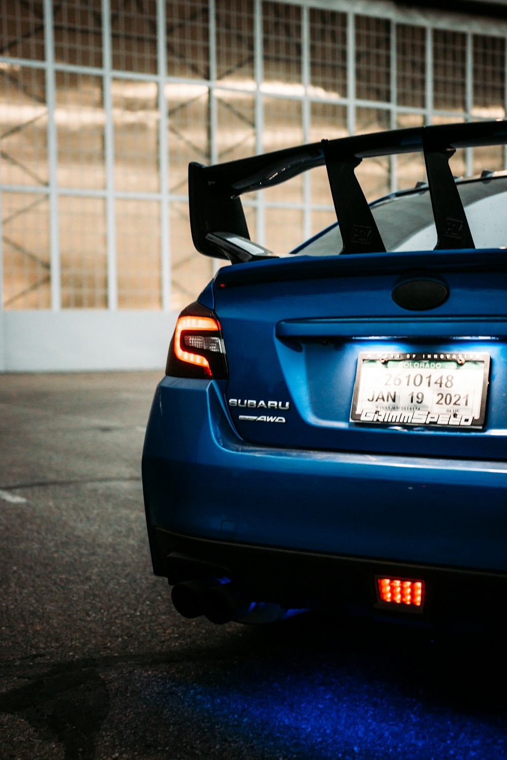 blue honda car on road during daytime