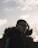 man in black hoodie wearing black sunglasses