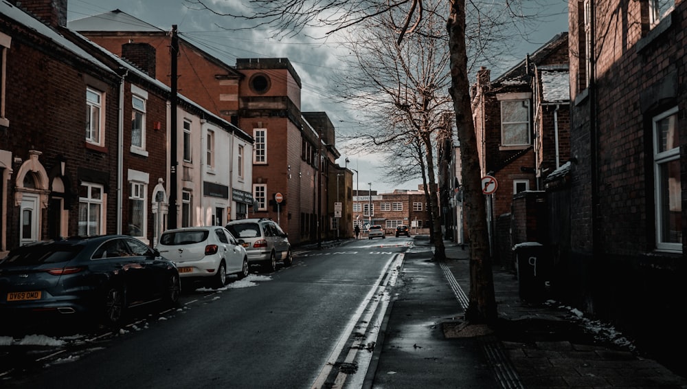 cars parked on side of the road during daytime