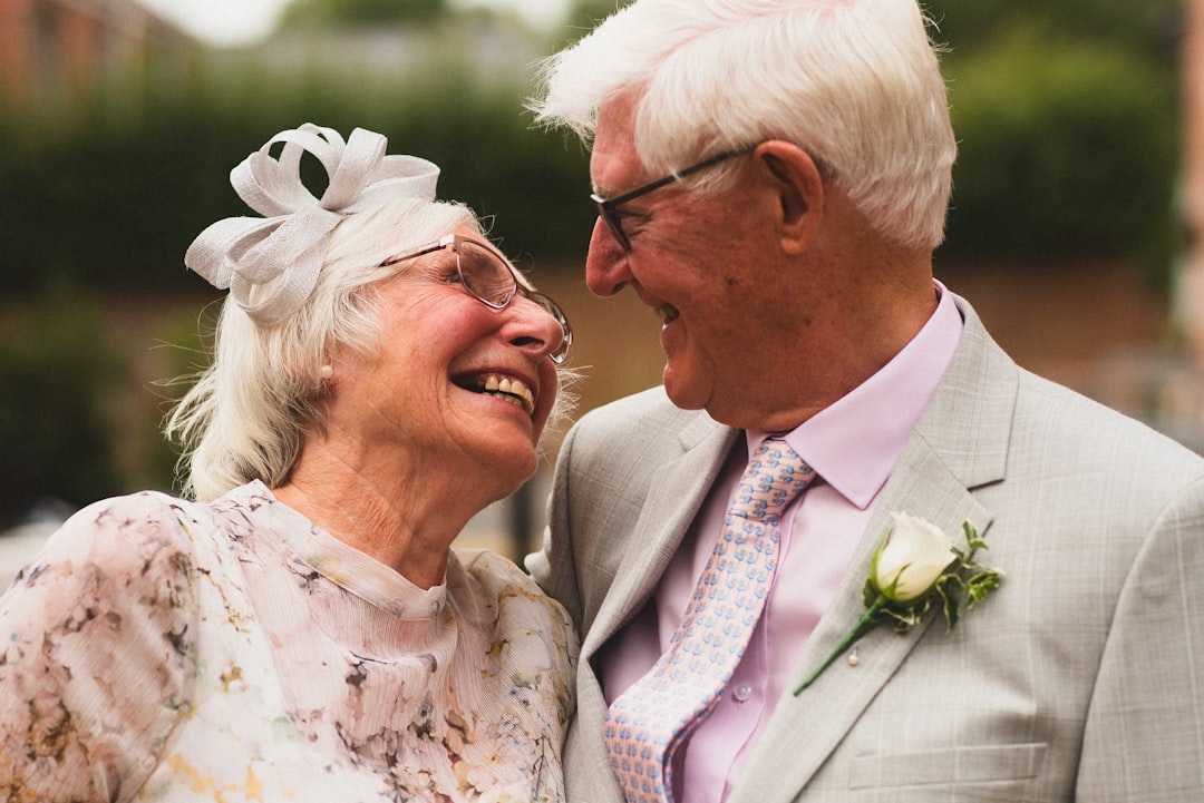 man in gray suit jacket beside woman in white floral dress, Forever love