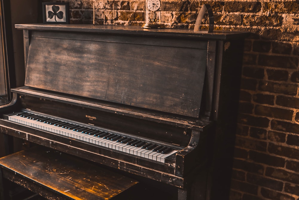 black and white upright piano