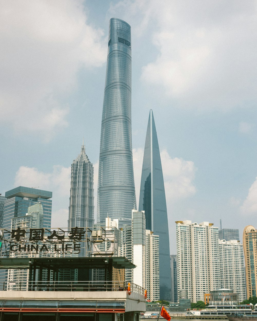 city skyline under white sky during daytime