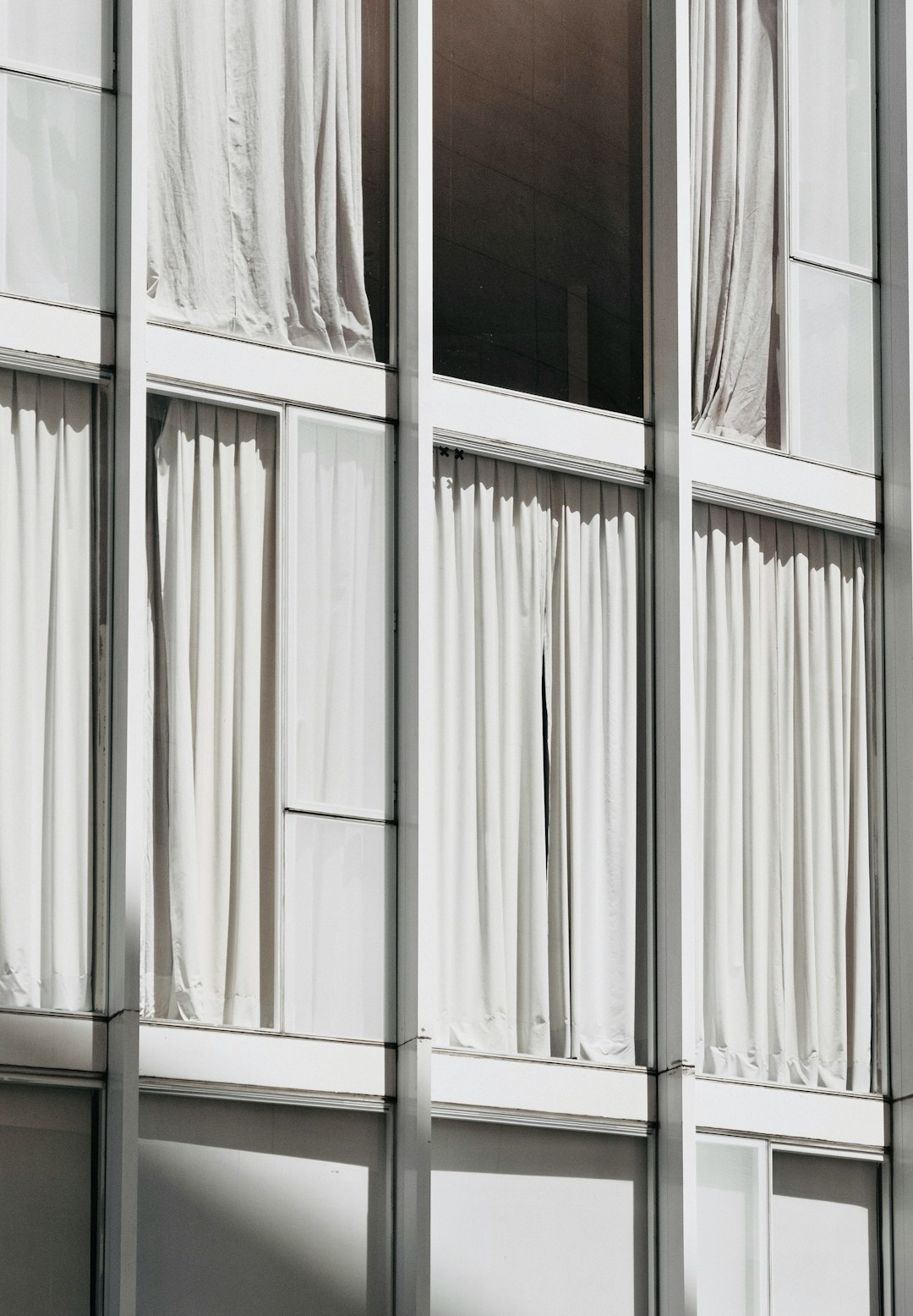 white wooden framed glass window