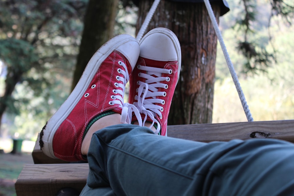 person wearing red converse all star high top sneakers photo – Free  Taichung Image on Unsplash
