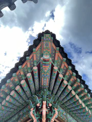Close-up of an intricately designed roof featuring swirling color patterns