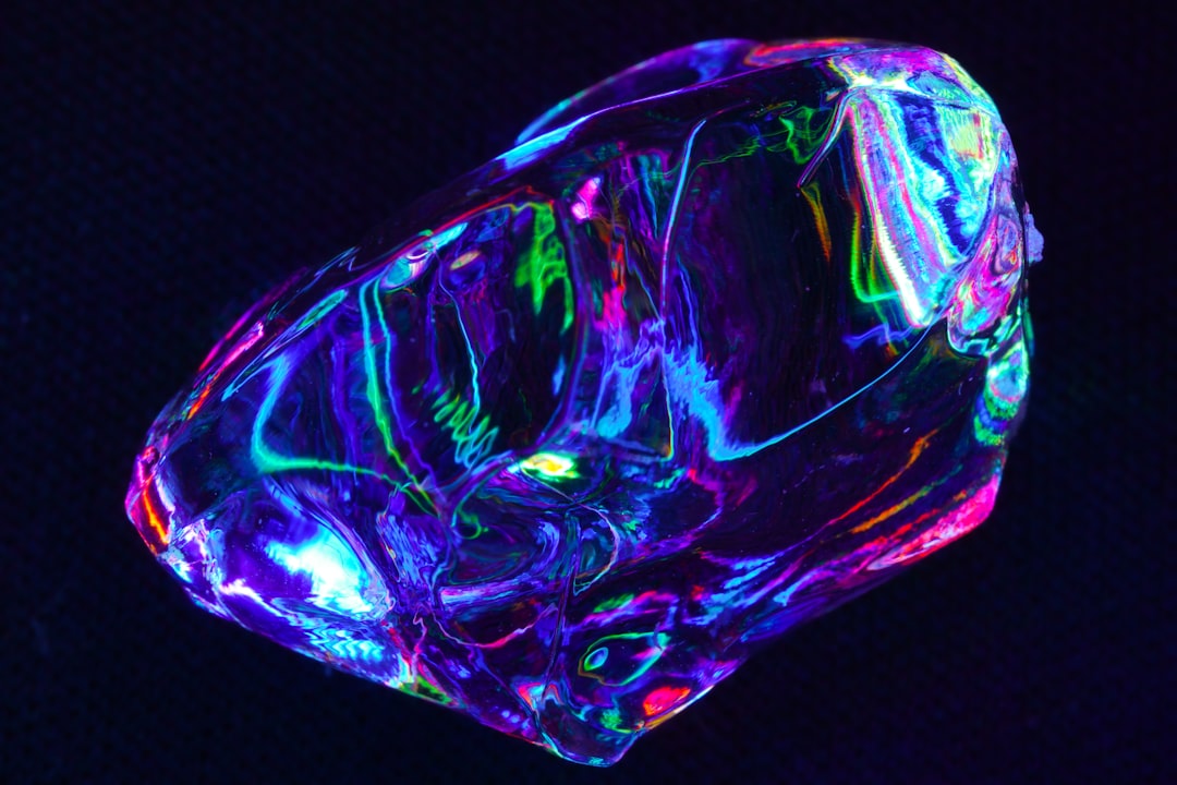 blue and purple glass container, Light trail in the ice cube