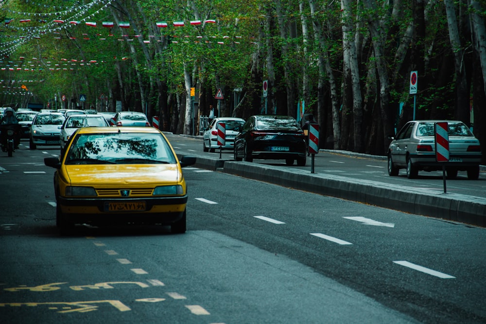 yellow car on the road