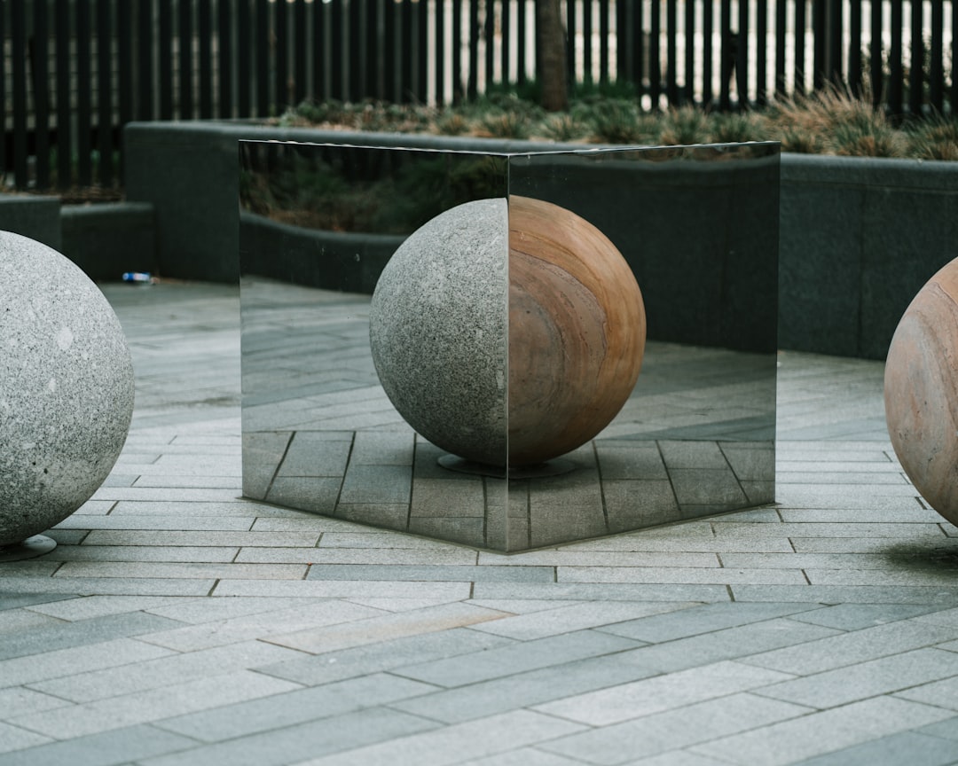 brown ball on gray concrete floor