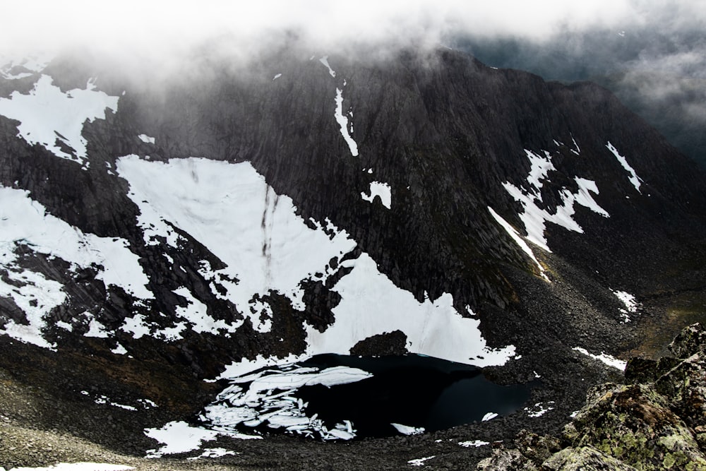 snow covered mountain during daytime