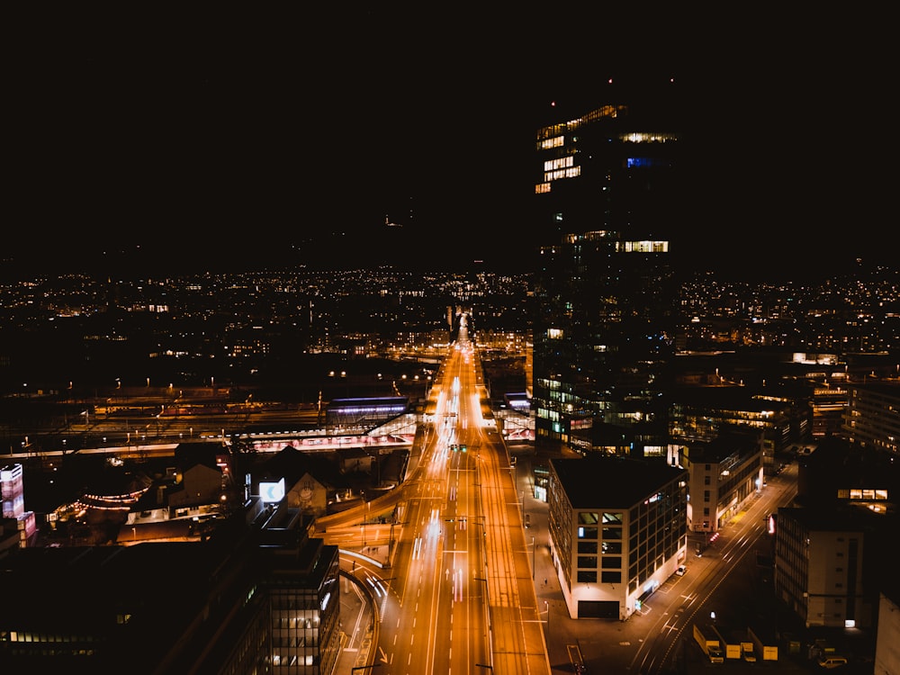 time lapse photography of cars on road during night time